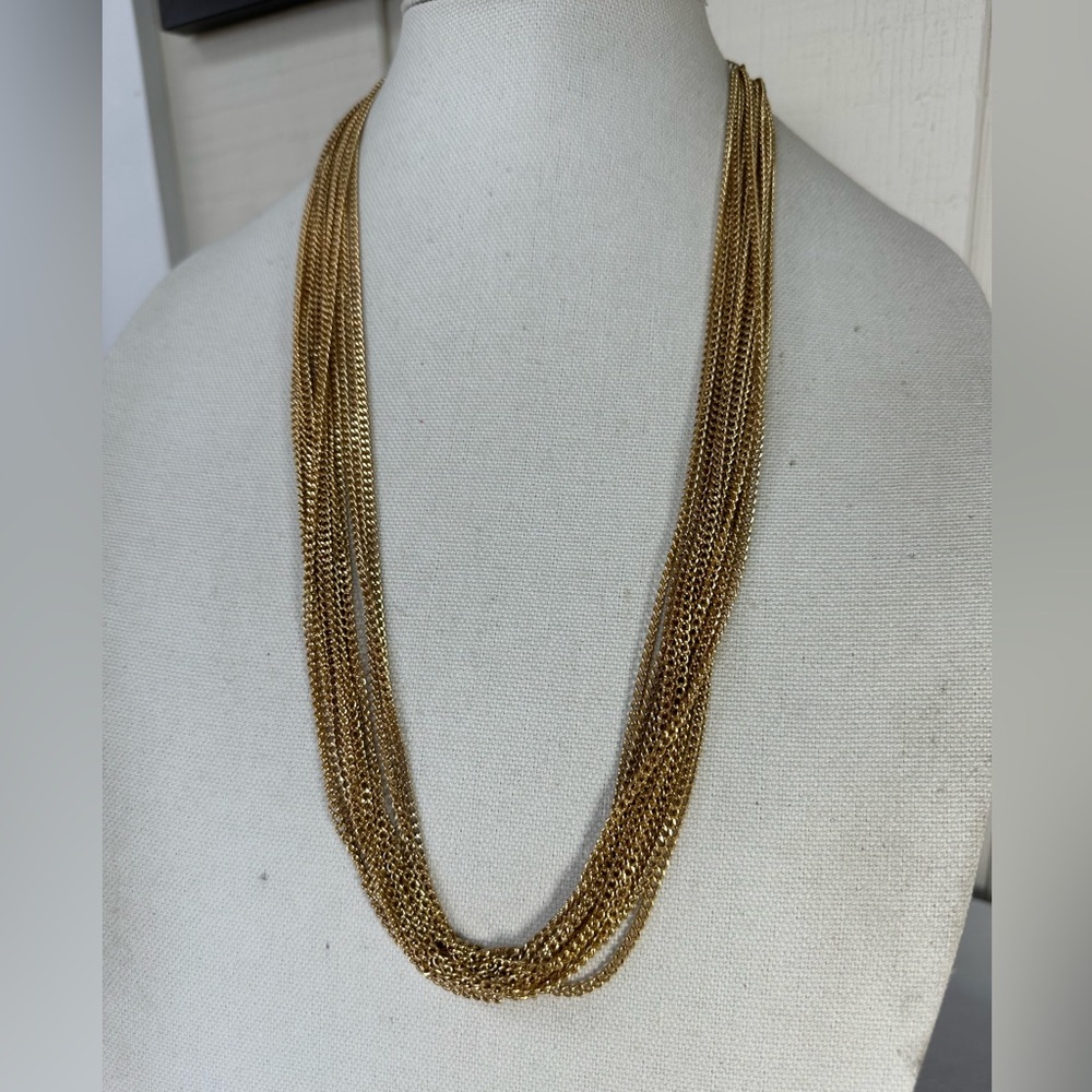 Long goldtone multi strand chain necklace